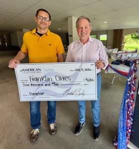 Mike Bailey presenting donation to Franklin Cares Outreach Ministry